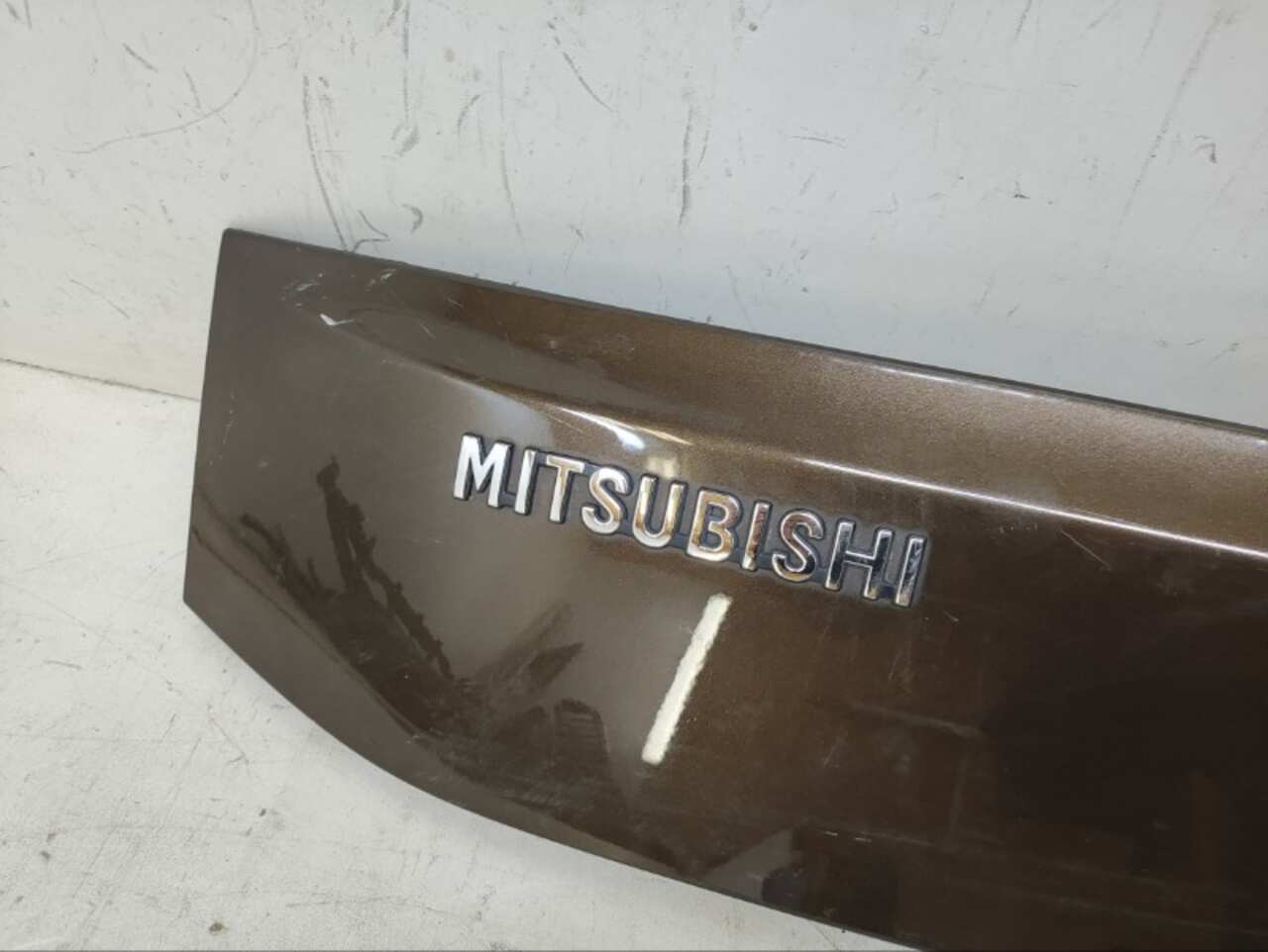 Накладка багажника MITSUBISHI PAJERO SPORT 3 2015- БУ 5817A263ZZ 193011